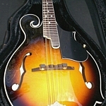Bean Blossom mandolin. So shiny! Look at the reflections